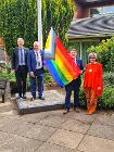 Councillors Keith Flunder, Tony Holmes, Joe Porter and Lyn Swindlehurst raise the Pride flag