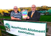 Winner Dave Scholes was presented with his iPad by Councillor Bill Cawley.