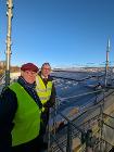 Cllrs Yates and Swindlehurst view the solar panel installation